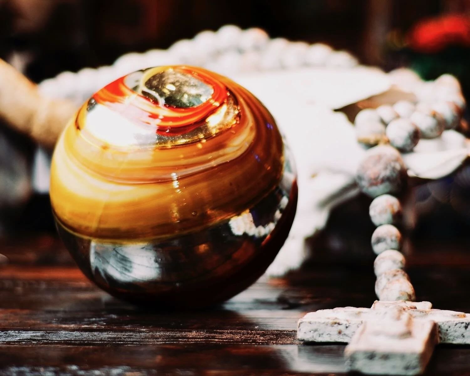 Handblown Mexican glass sphere decorative accent with glossy finish
