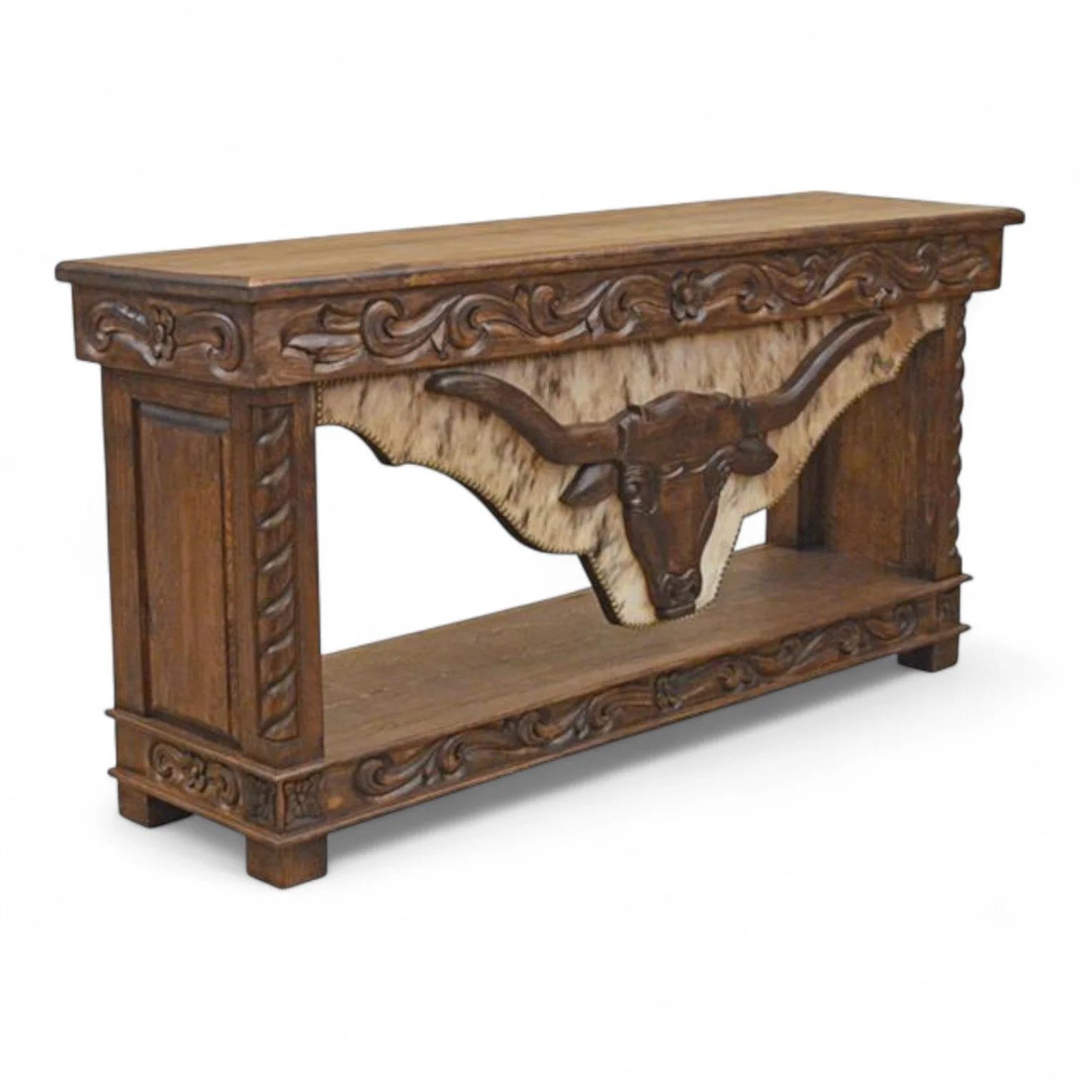 Handmade in Mexico, the Old West Longhorn Carved Console features a cowhide front panel, carved Longhorn detail, and trunk-style storage. Rustic Western design, 72" x 20" x 36".
