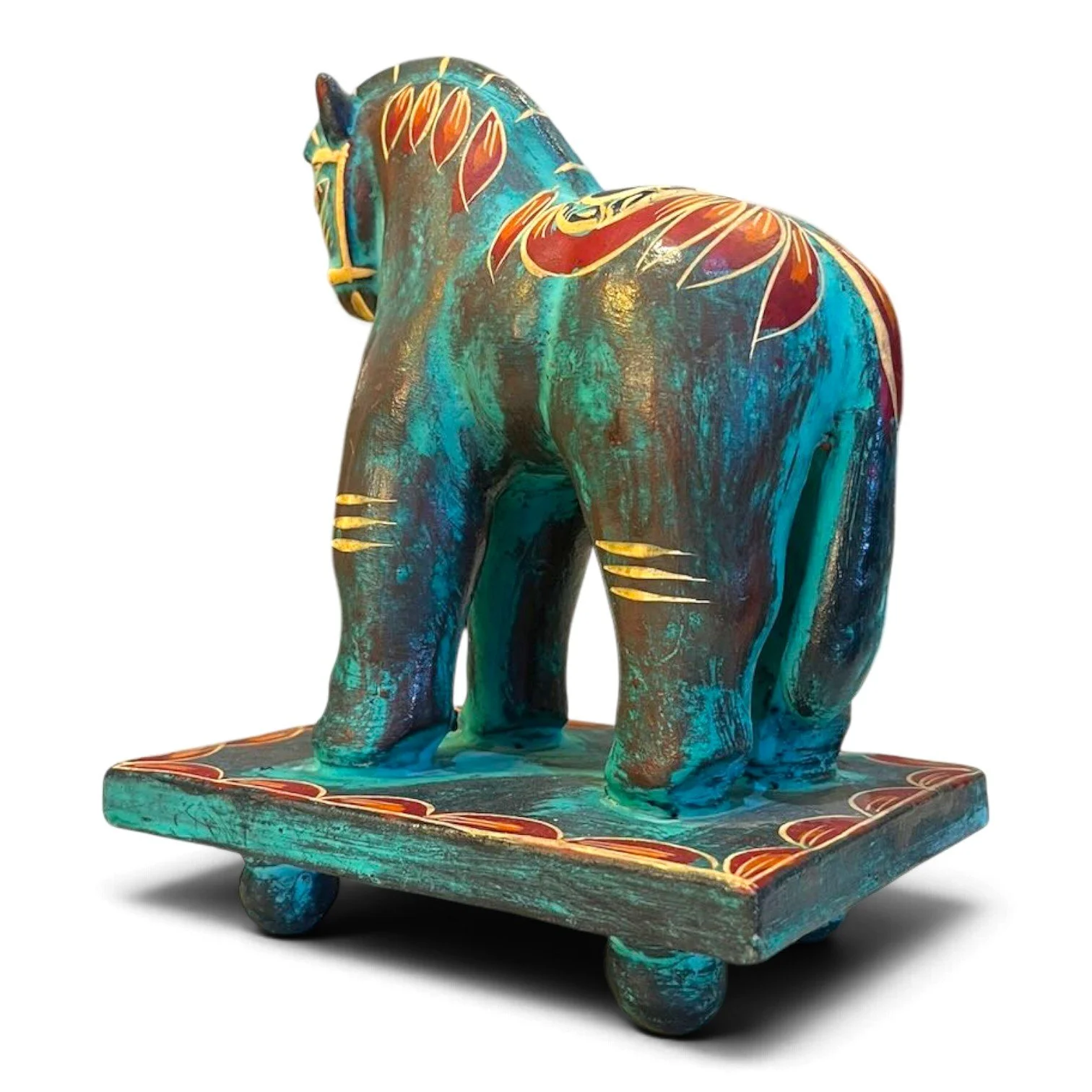 Handmade clay Trojan horse figure with unique hand-painted design on a pedestal