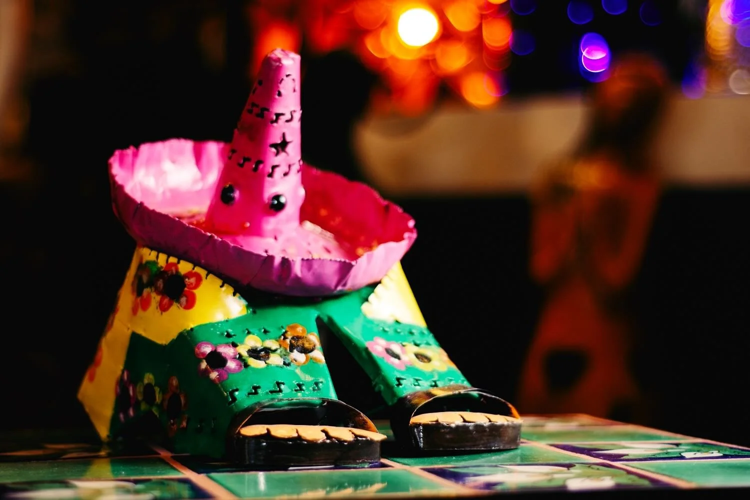 Painted tin Siesta Man from Mexico.