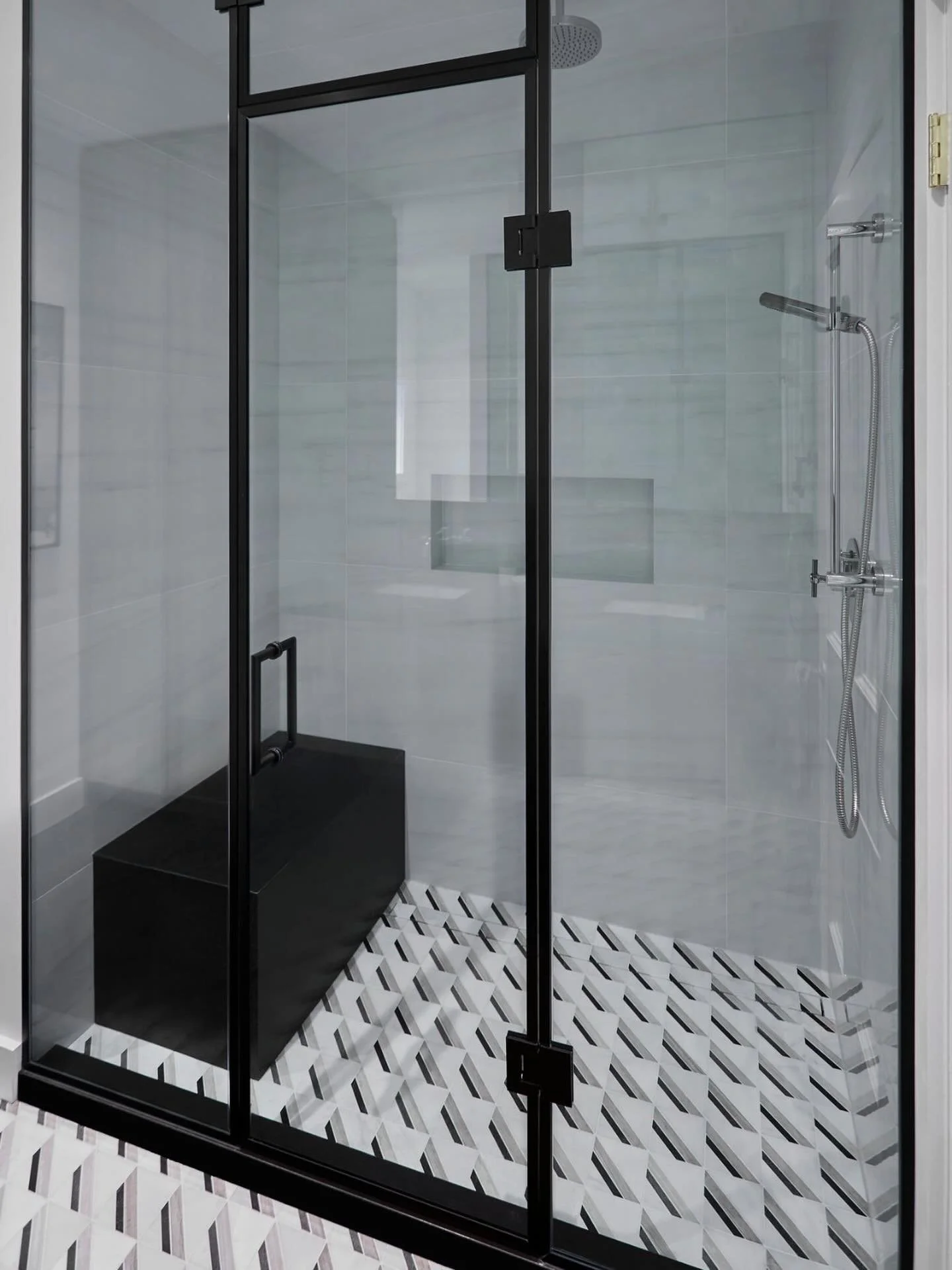 The power of contrast - whether pairing black metal finishes with light tiles or balancing bold patterns  against a neutral backdrop, the thoughtful use of contrast elevates design and creates one of a kind installations. 

#bathroom #bathroomdesign 