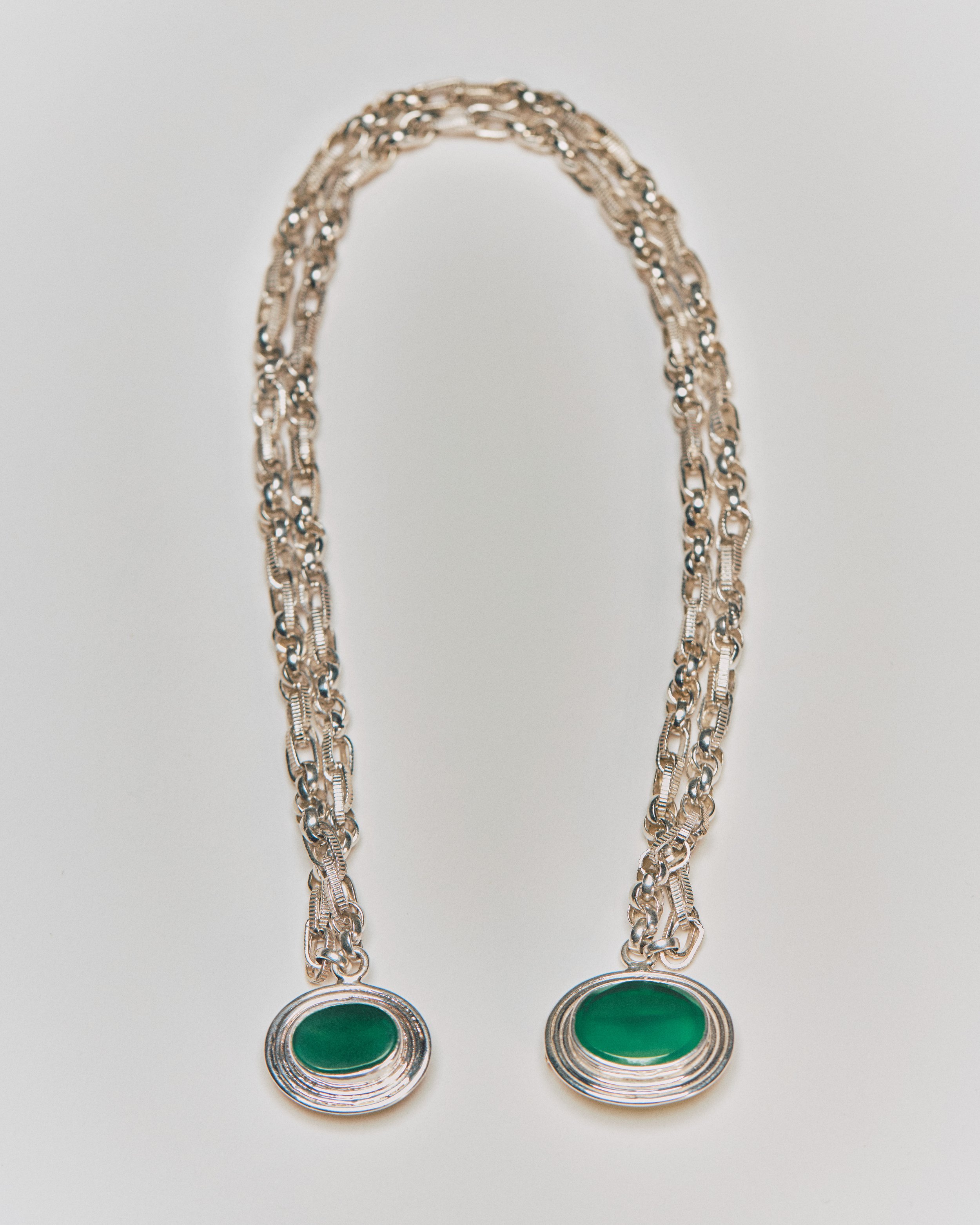 Silver chain necklace with green stone pendants