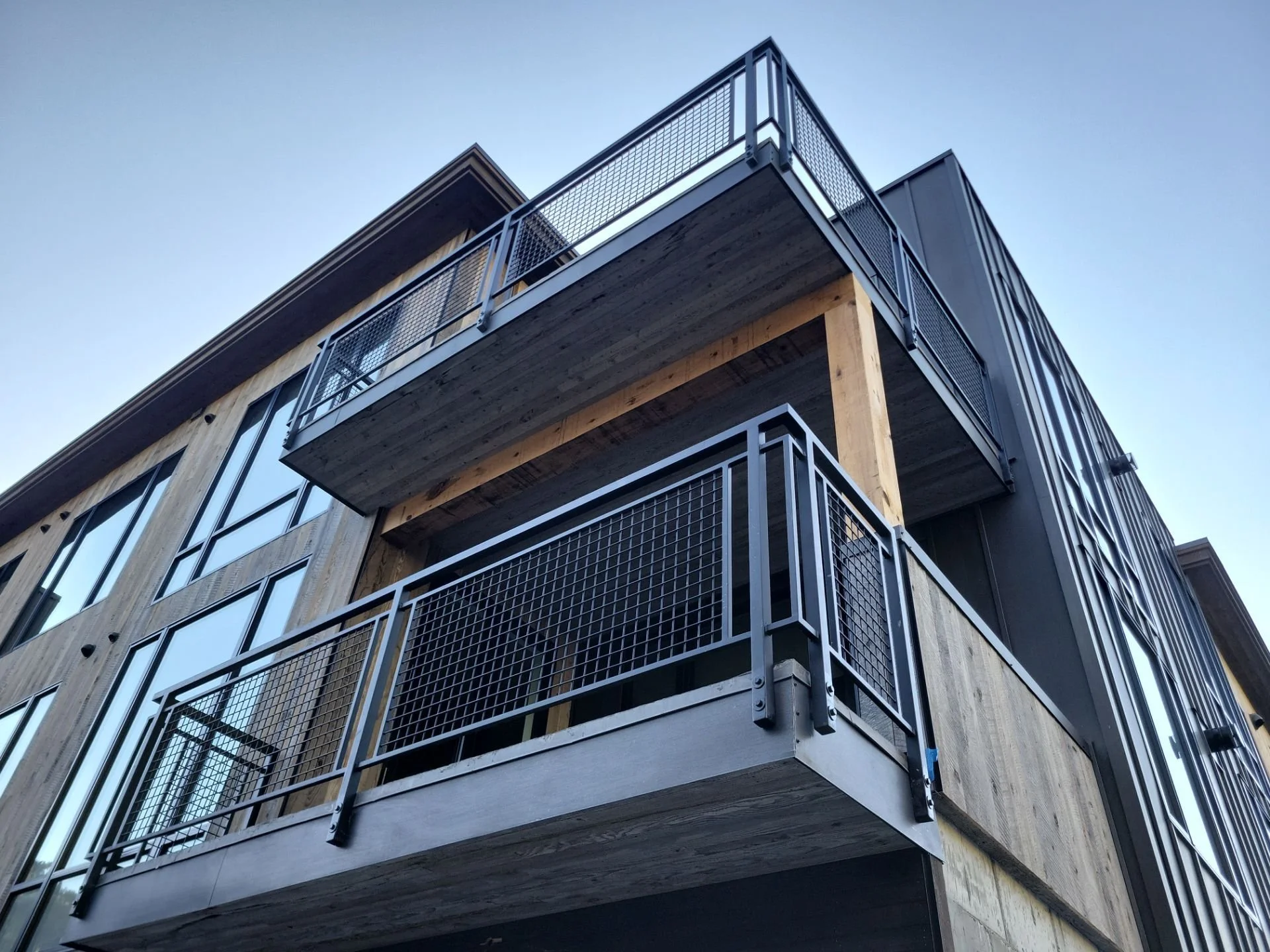 Custom metal handrail installed at resort providing safety and modern architectural design