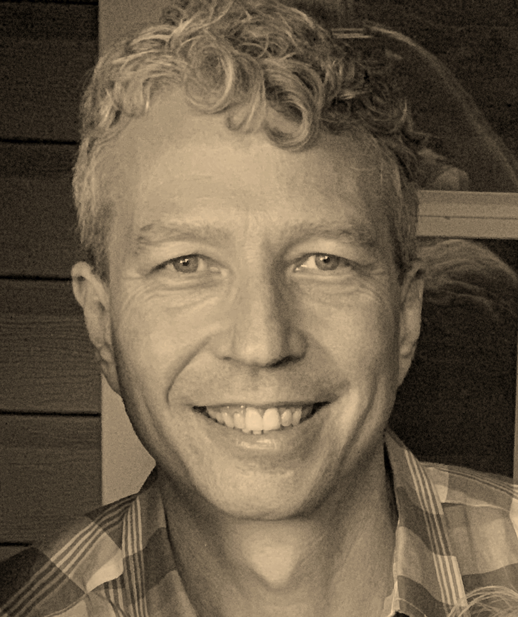 Head shot of John Lenac