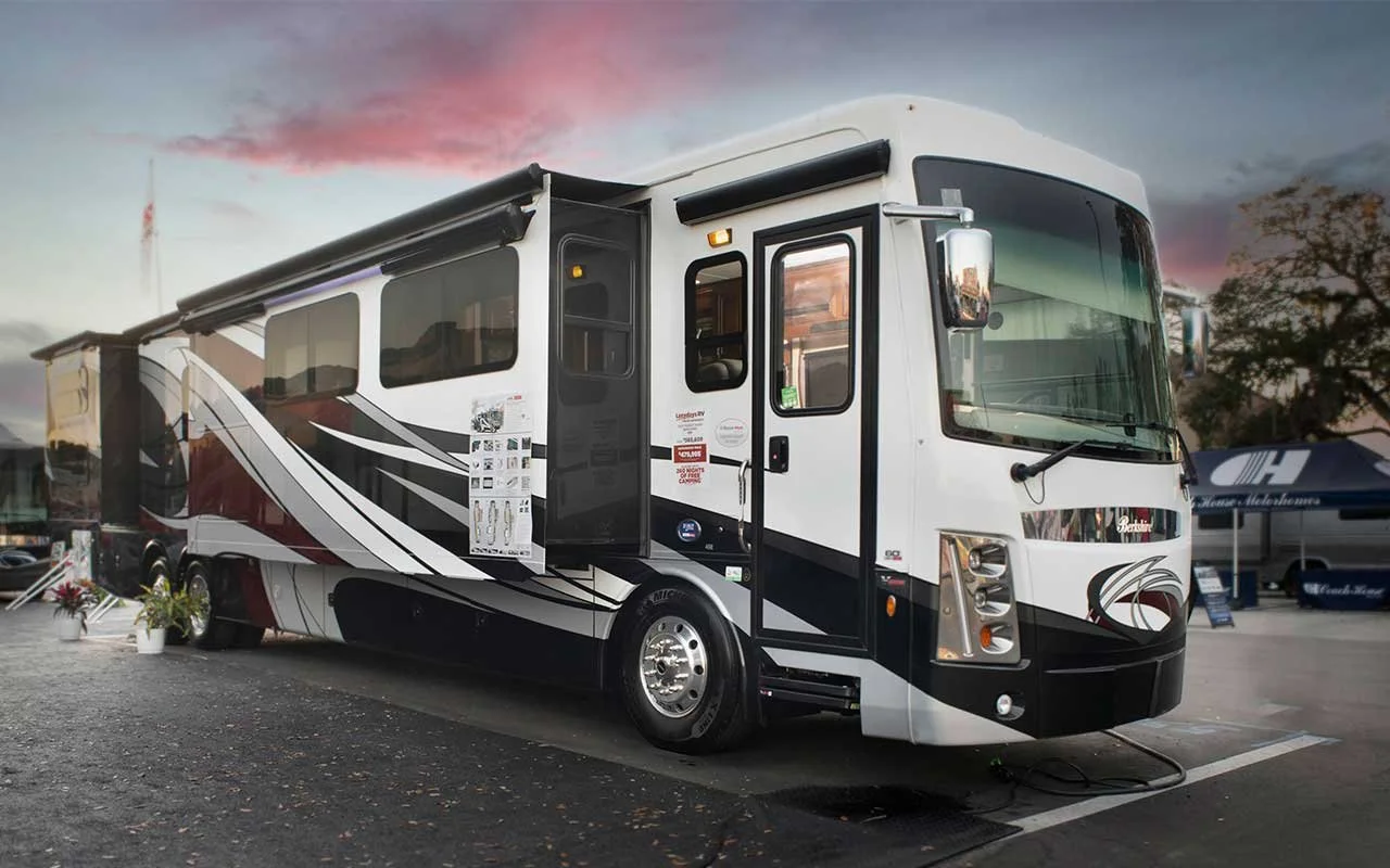 Large luxury motorhome with a high-gloss 10H ceramic coating finish. Nano Diamond provides mobile RV detailing in Kelowna, BC, featuring specialized UV protection and exterior preservation for gel coat and fiberglass surfaces.