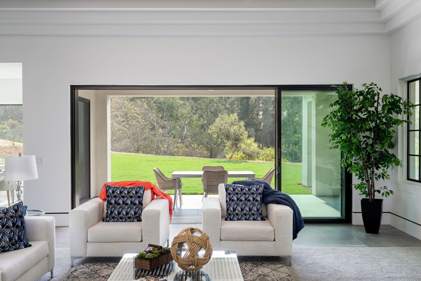 Luxury that slides into view. 🌿✨Blur the line between indoors and out with the Stacking Multi-Glide patio door&mdash;where expansive glass panels glide effortlessly to reveal a world of elegance, light, and seamless connection to nature.🏡 Step i