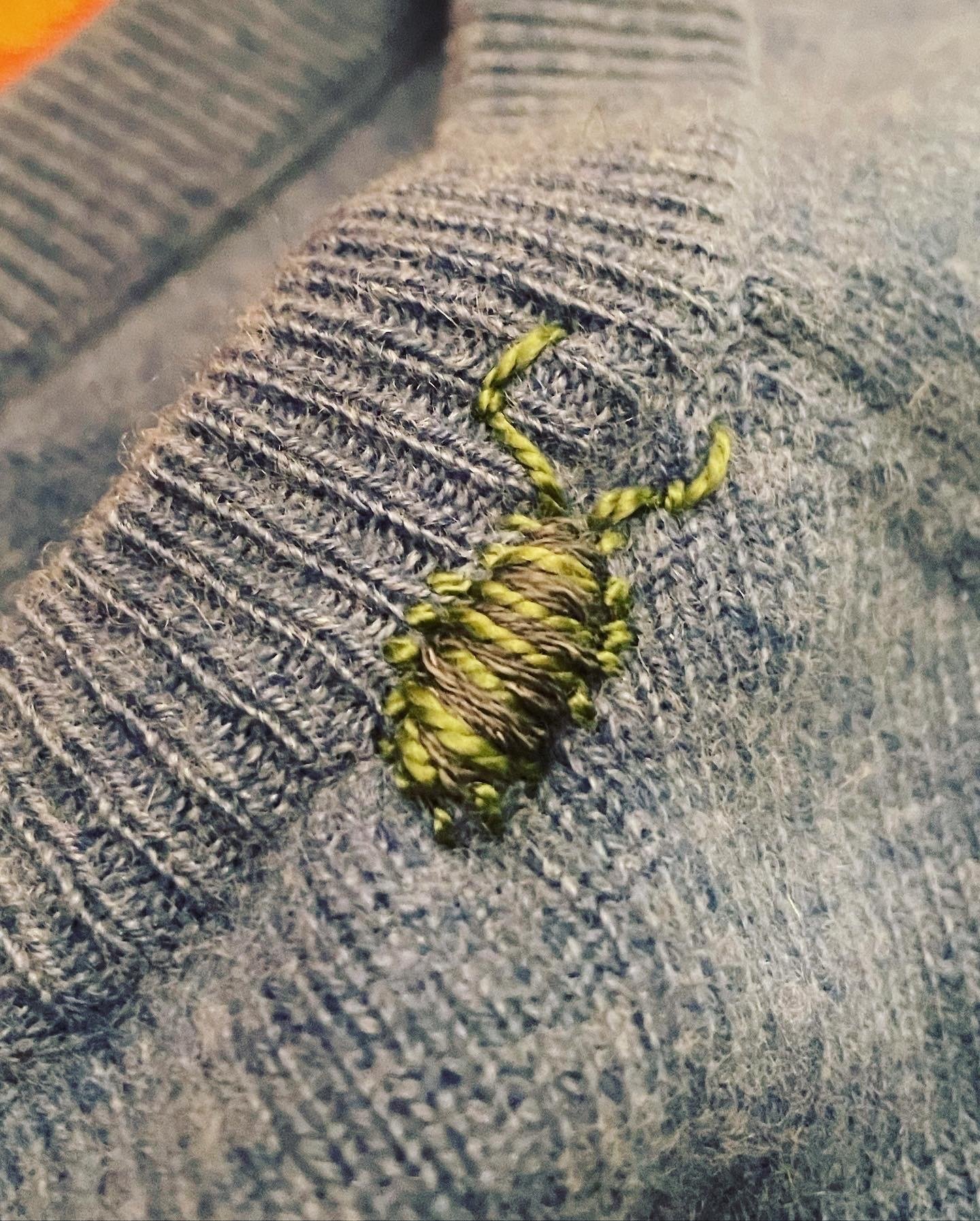 cotton thread on cashmere sweater