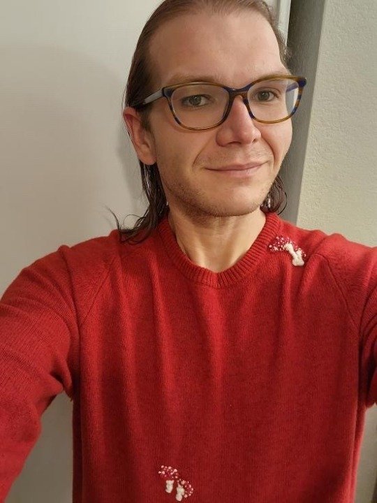 cotton thread on wool sweater