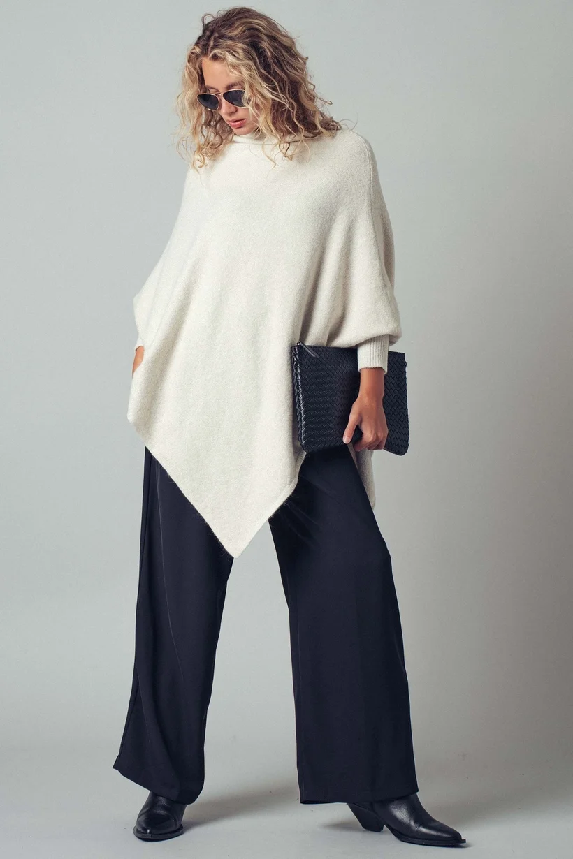 Shimmer Asymmetric Hem Knit Poncho 4.webp