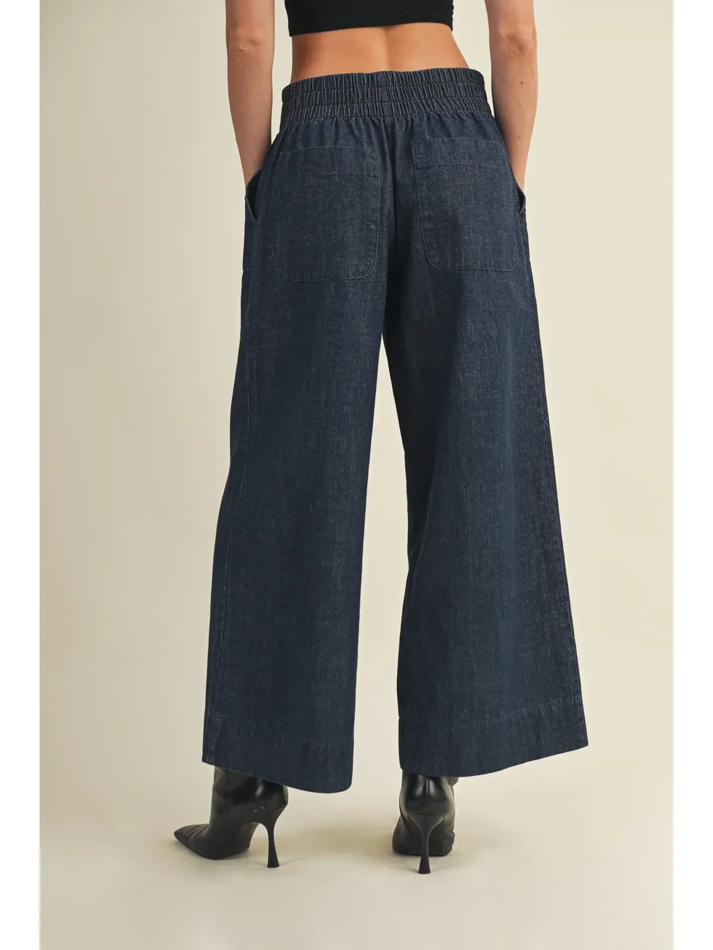 Back Bending Denim Pants (4) - Stock Photo.webp