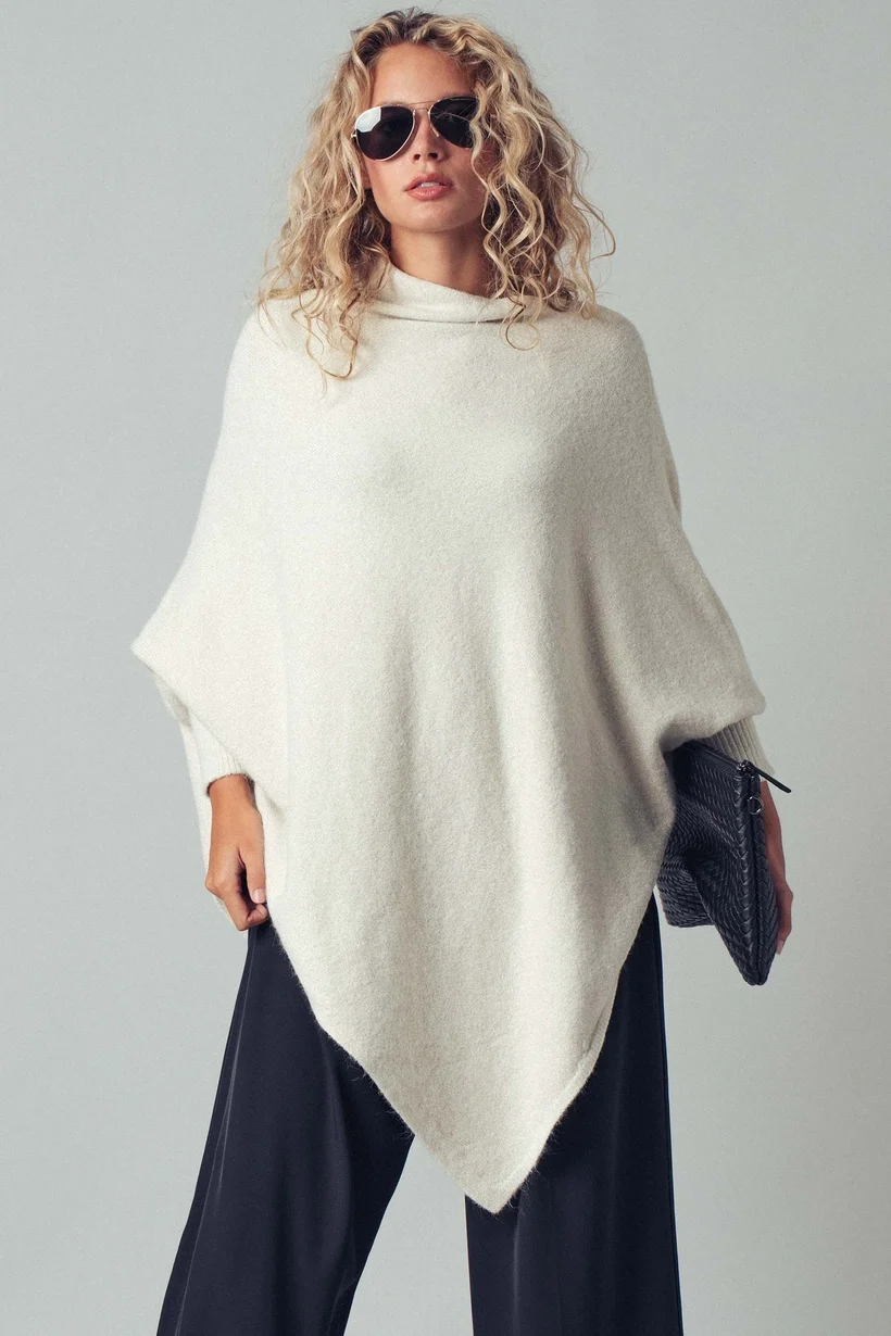 Shimmer Asymmetric Hem Knit Poncho 1.webp
