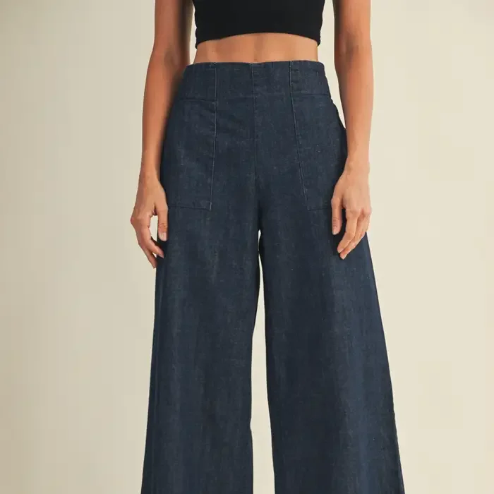 Back Bending Denim Pants - Stock Photo.webp