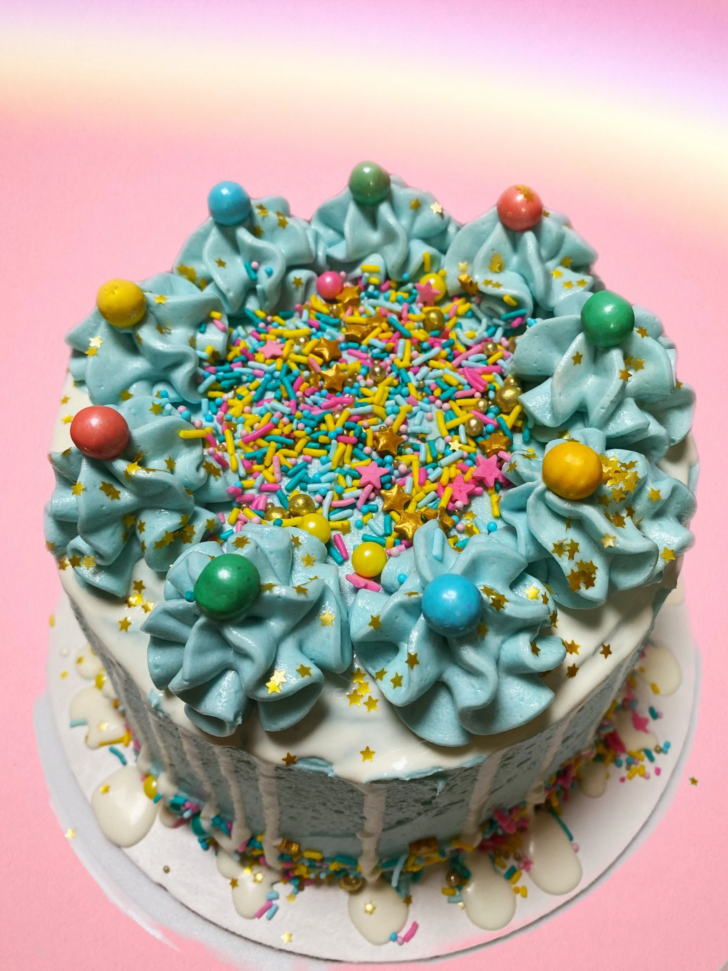 Cotton Candy Drip Cake with Swiss Meringue Buttercream and White Chocolate Ganache Drip
