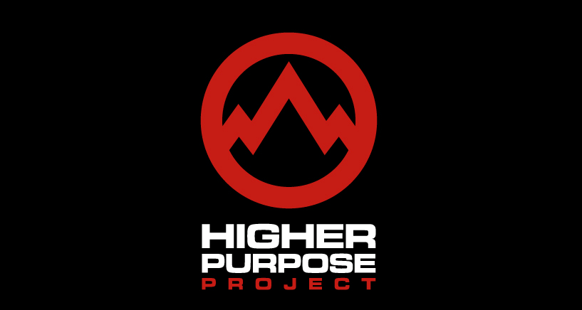 Logo of Higher Purpose Project with red mountains inside a circle and text