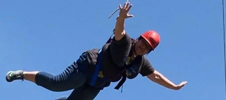 Participant on the Smoky Hill Adventure Program ropes course
