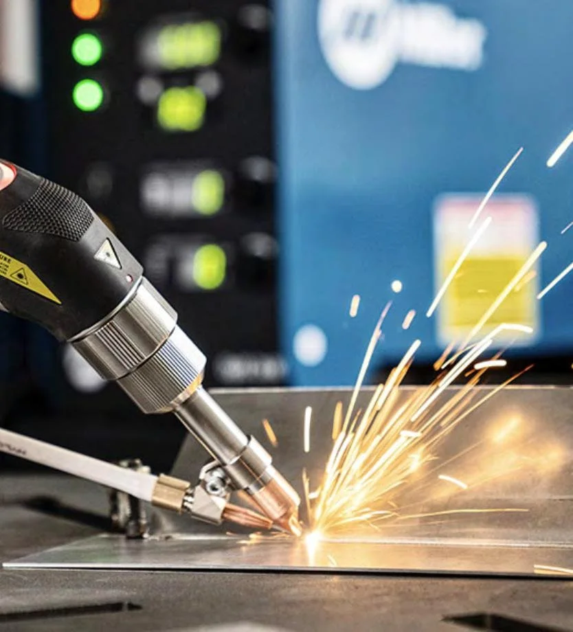 Metalworking sparks in the fabrication workshop.