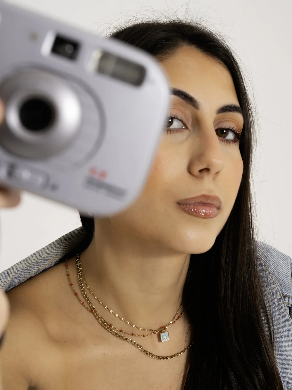 Creator filming influencer content with a camera