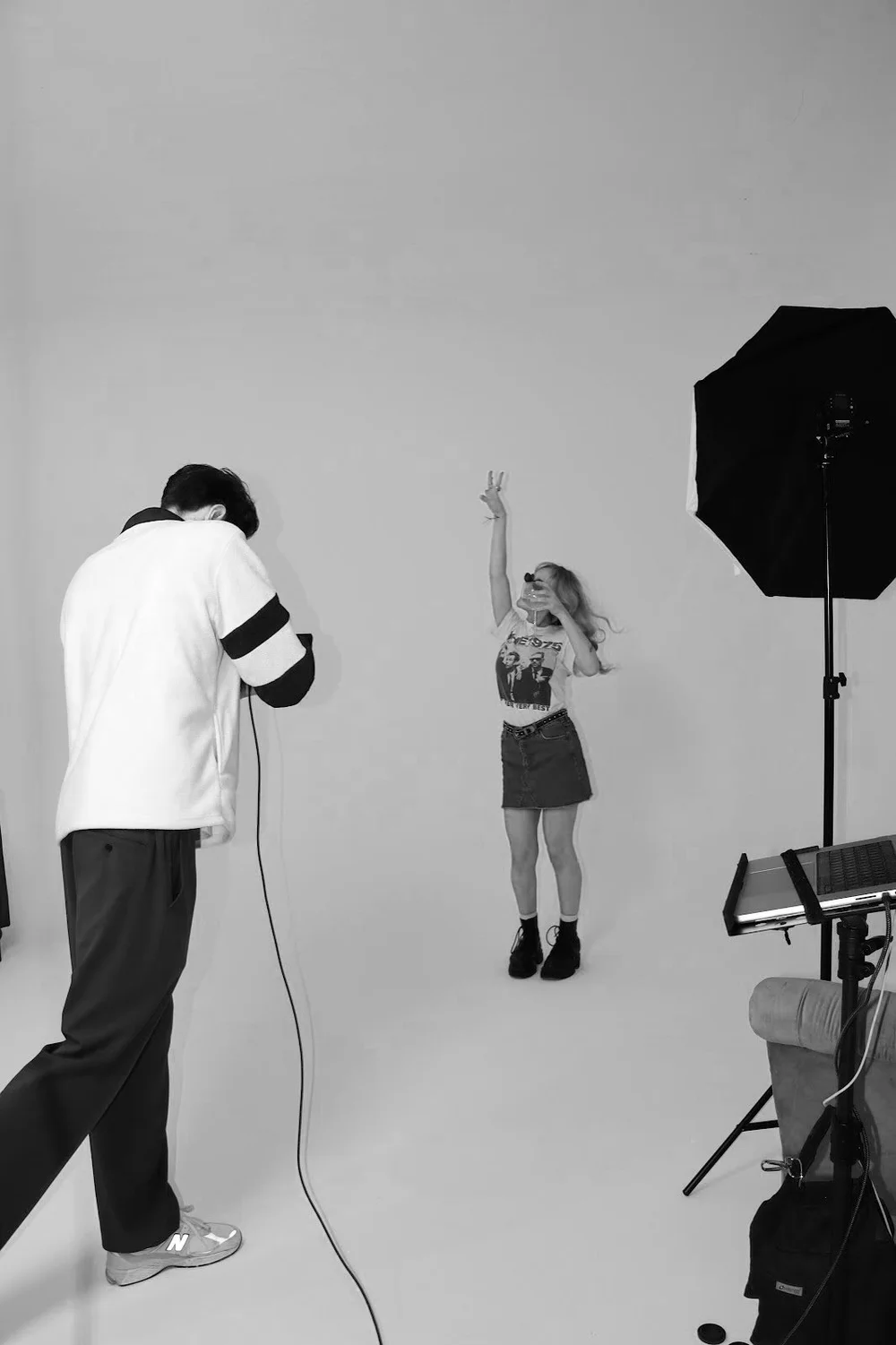 Photographer on a brand content shoot in a studio