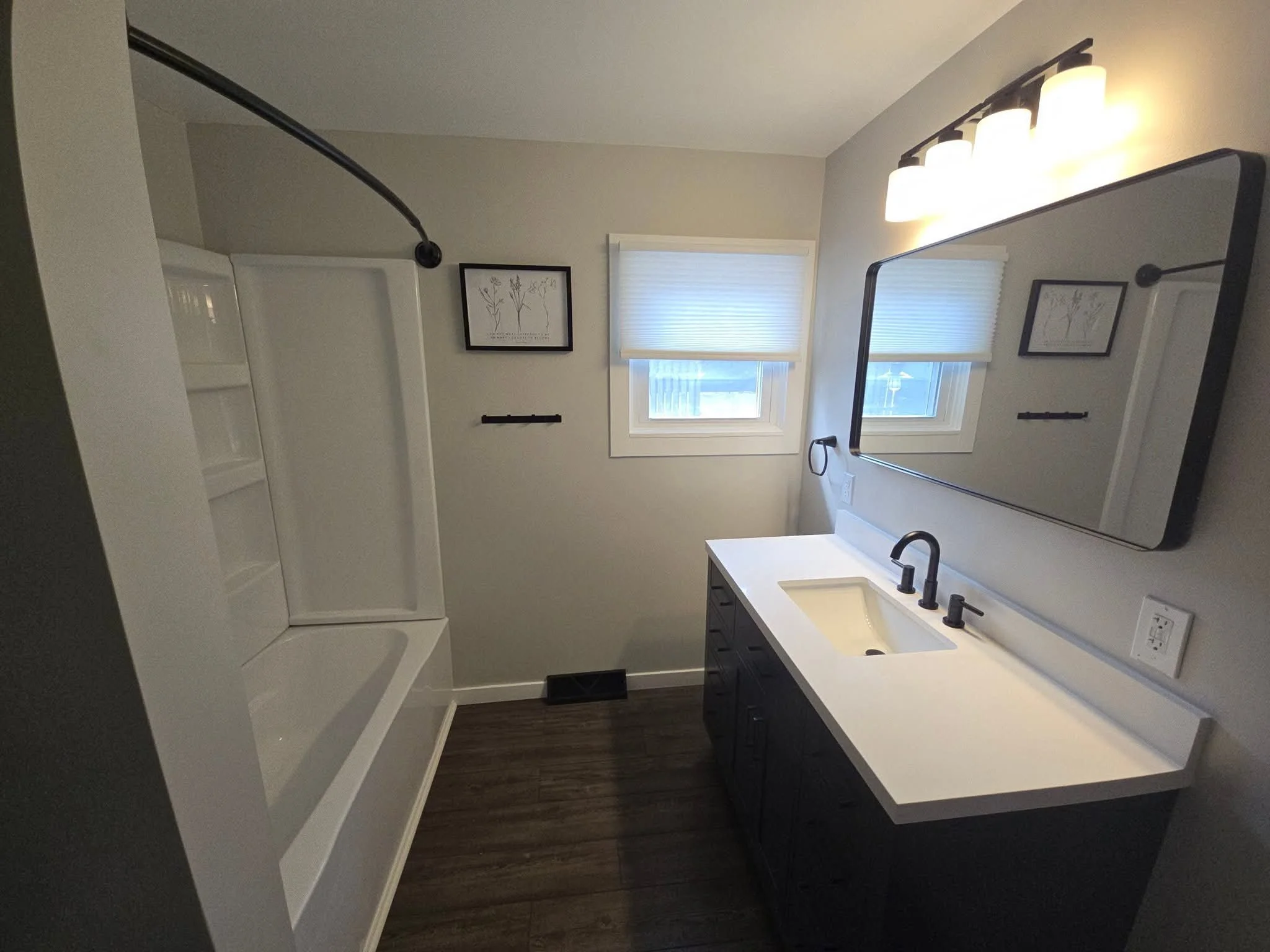 Sleek & Elegant Bathroom Transformation – Clean Lines, Modern Fixtures, and Timeless Style
This bathroom remodel delivers a refined, modern upgrade with clean lines, elegant finishes, and high-function design. Featuring a fresh white vanity with matt