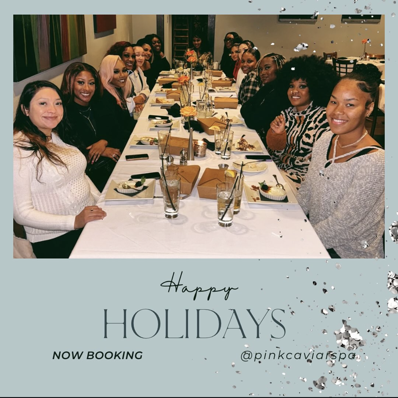 A group of women sitting at a long dining table in a restaurant, celebrating together with food and drinks, for the holiday season, with a New Year or Christmas theme, and a text overlay that says "Happy Holidays" and "Now Booking."