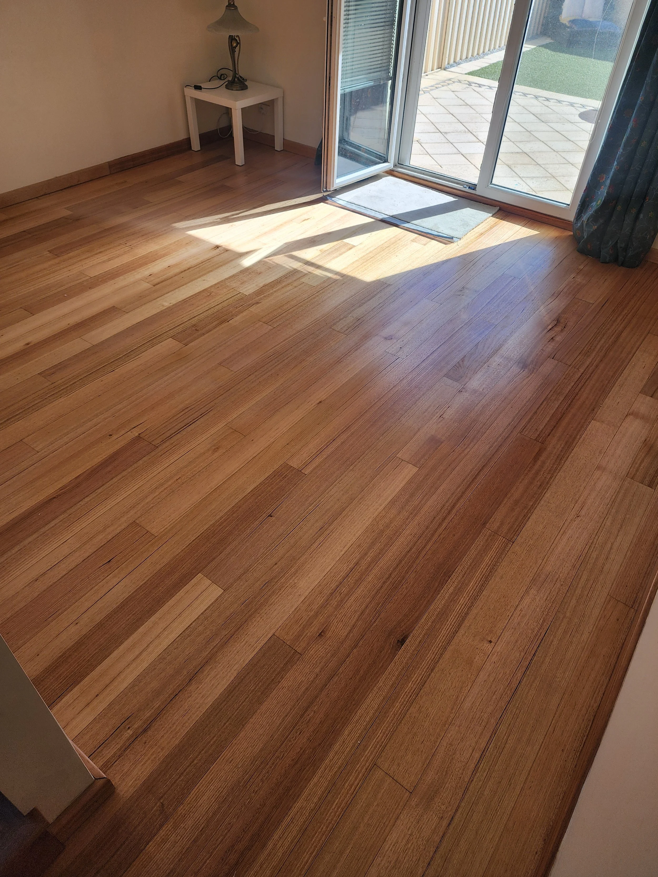 High-grade Blackbutt floor installation by Wood Restore, completed with a natural oil finish for long-lasting durability.