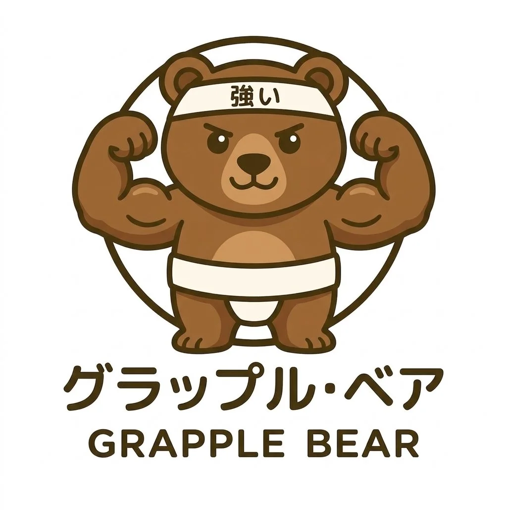A cartoon bear with a muscular physique wearing a headband, flexing its arms, with Japanese characters on the headband and the words 'GRAPPLE BEAR' below in English.