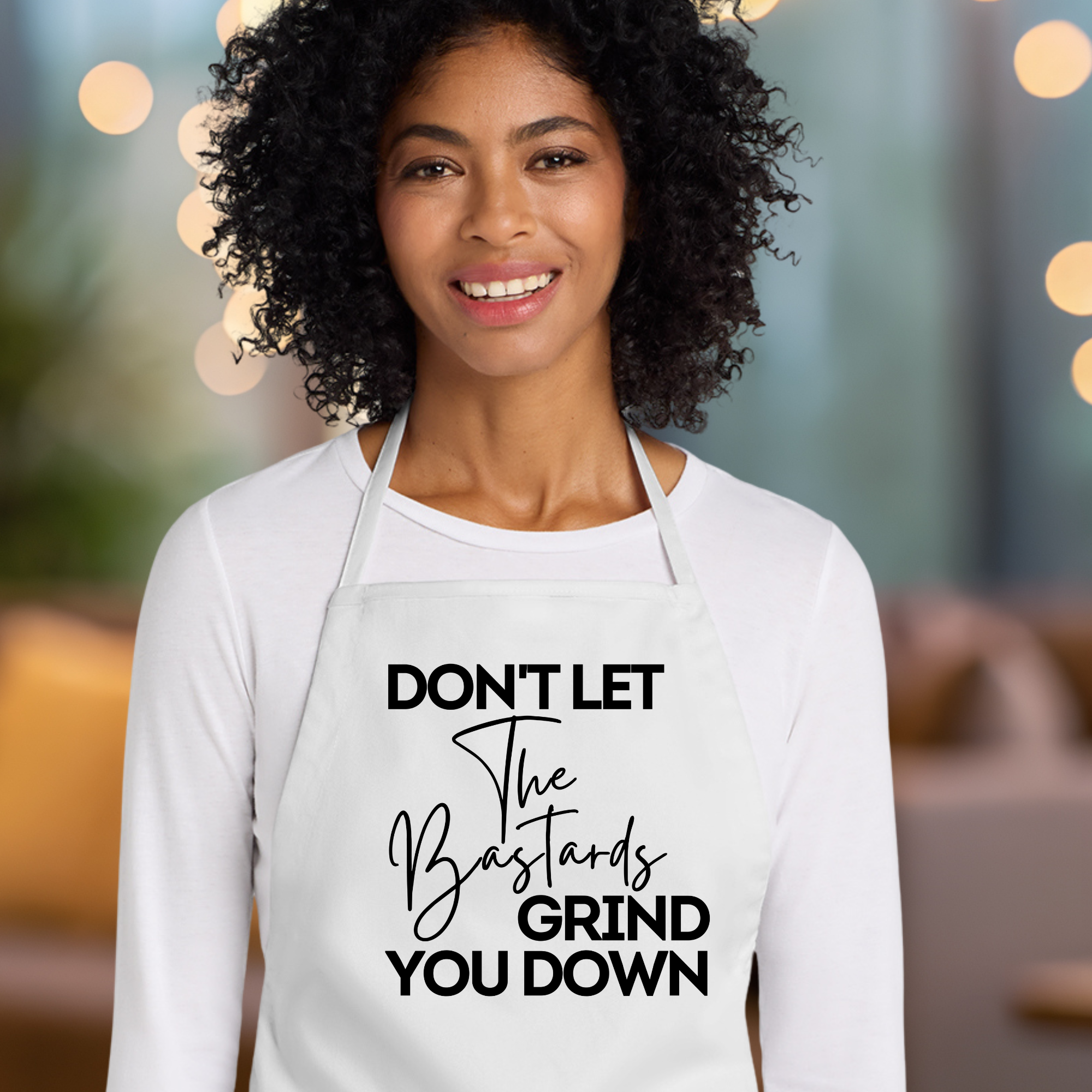 Don't Let The Bastards Grind You Down Apron In White.png