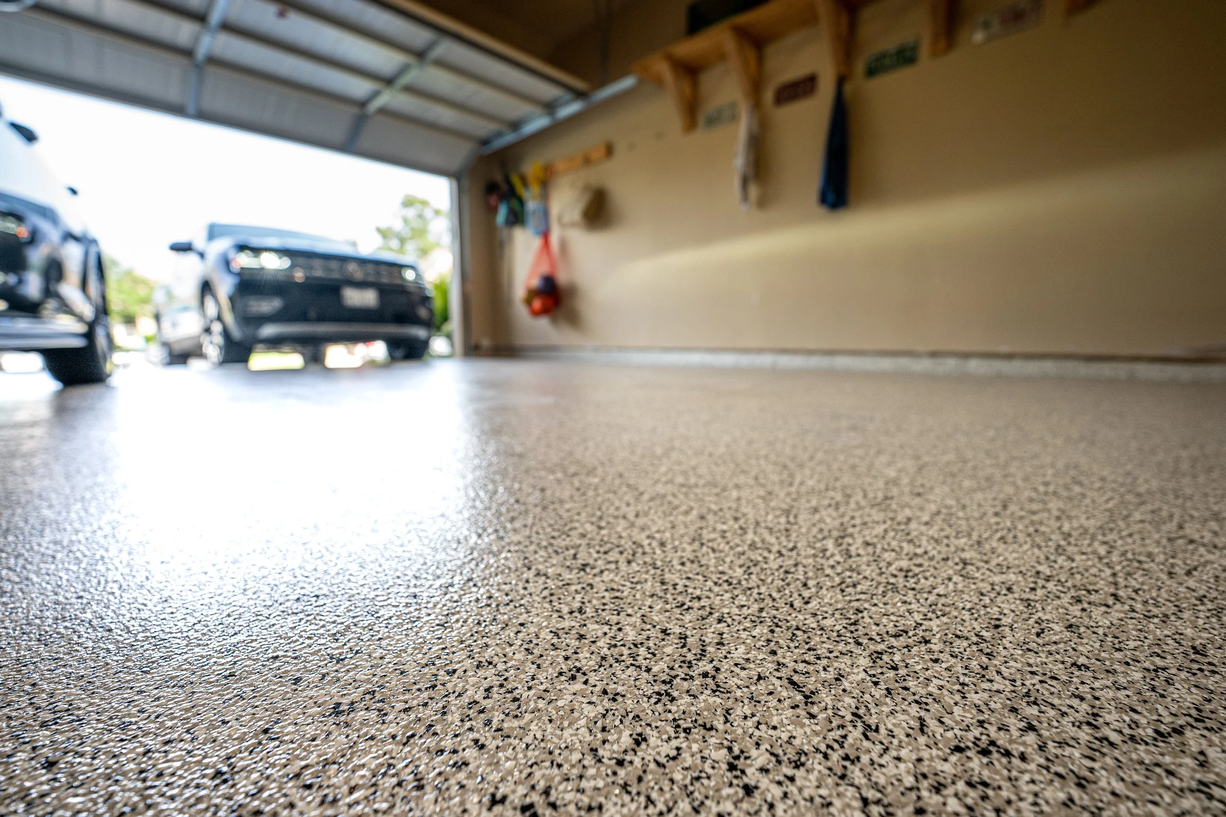 Flaked Epoxy Garage Floor. Flaked Coating Garage floor. Polyaspartic Garage Floor in Colorado
