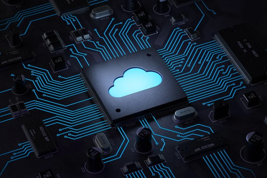 A computer circuit board with a glowing cloud icon in the center, representing cloud computing technology.