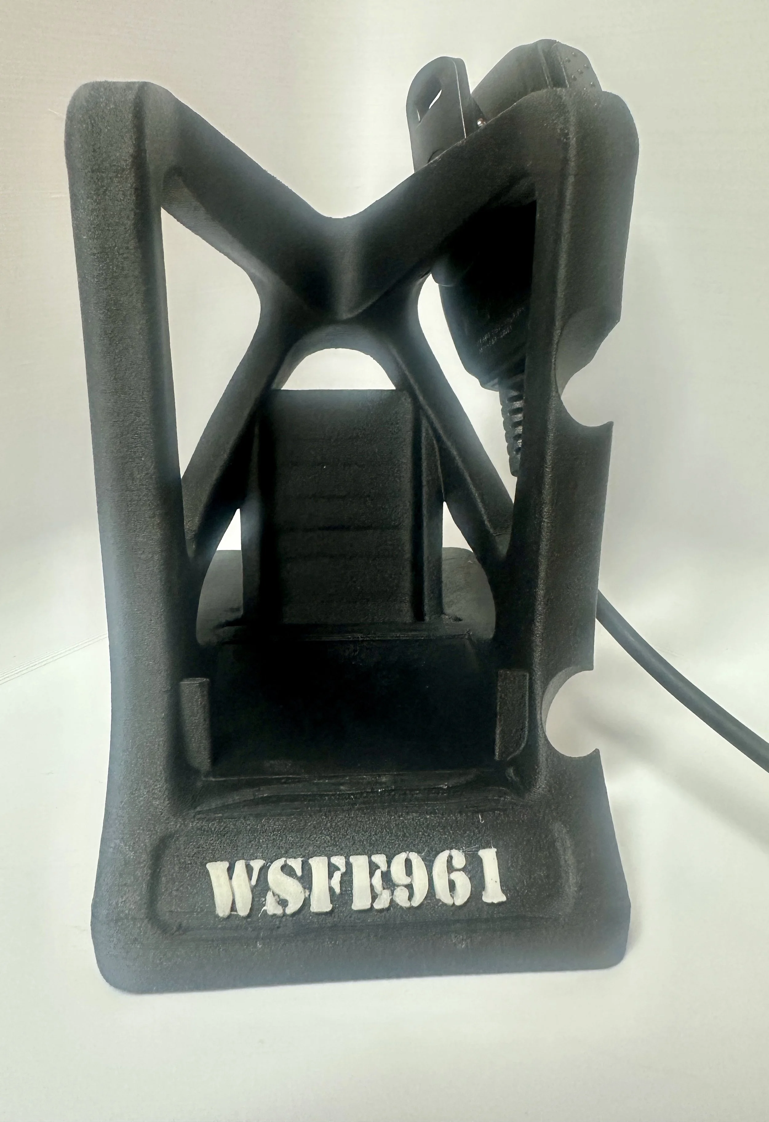 Precision-milled RocketDock Elite cradle showing side jack clearance and rugged mesh finish