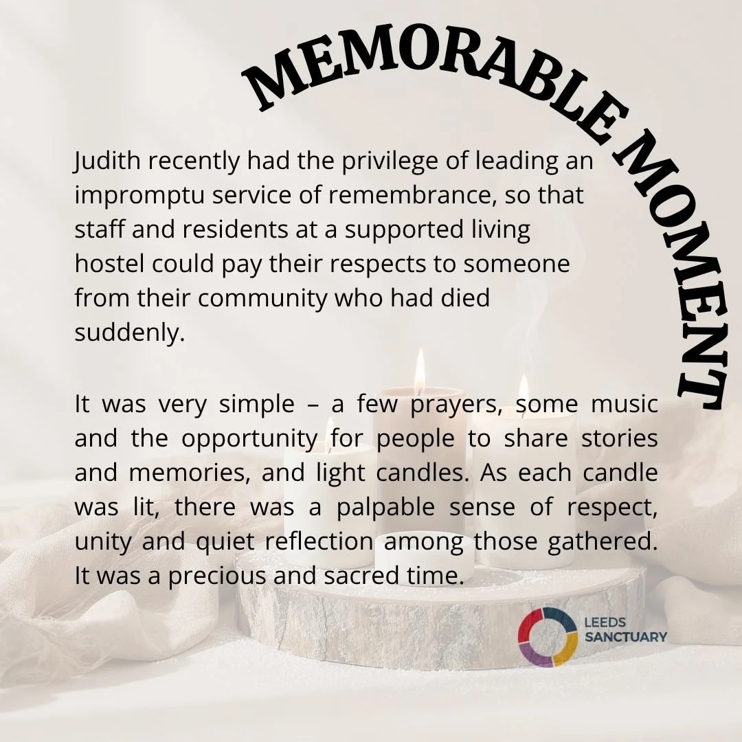 Memorial message on a white background with a lit candle and a multicolored logo at the bottom right corner.