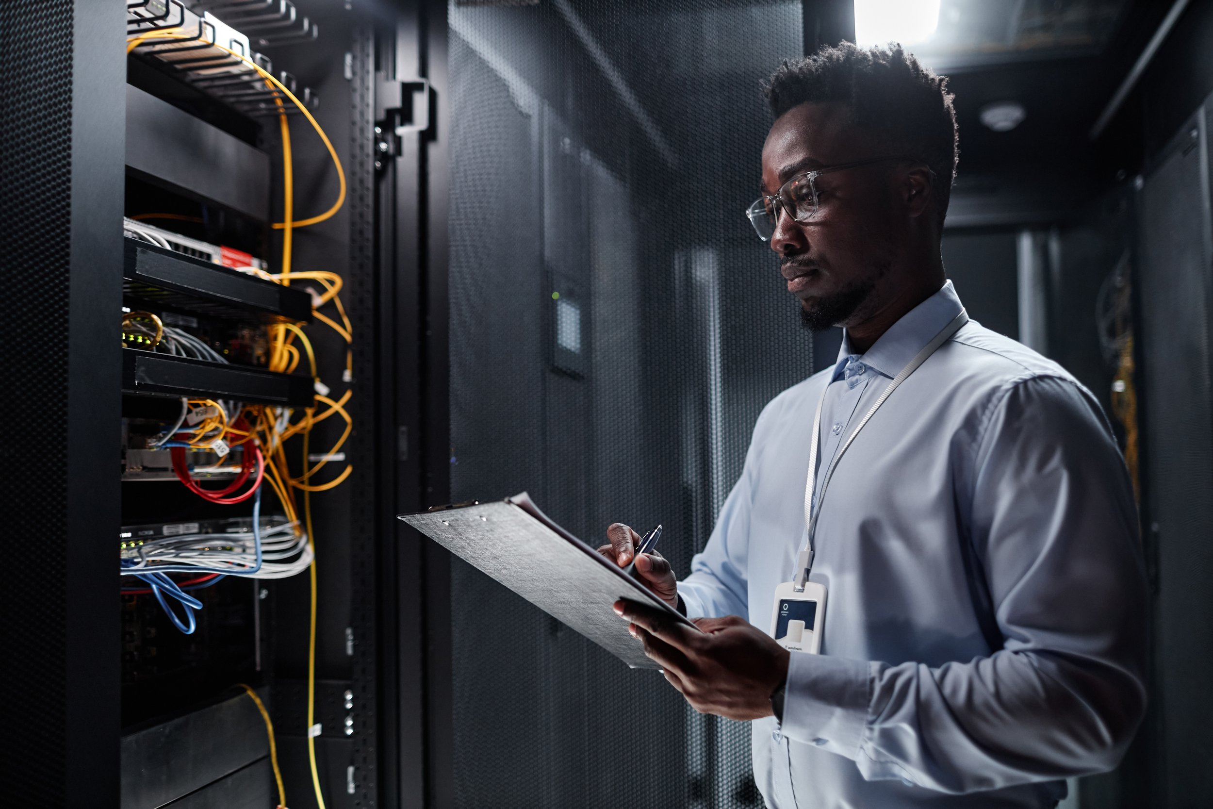 network-engineer-working-with-server-cabinet-data-center.jpg