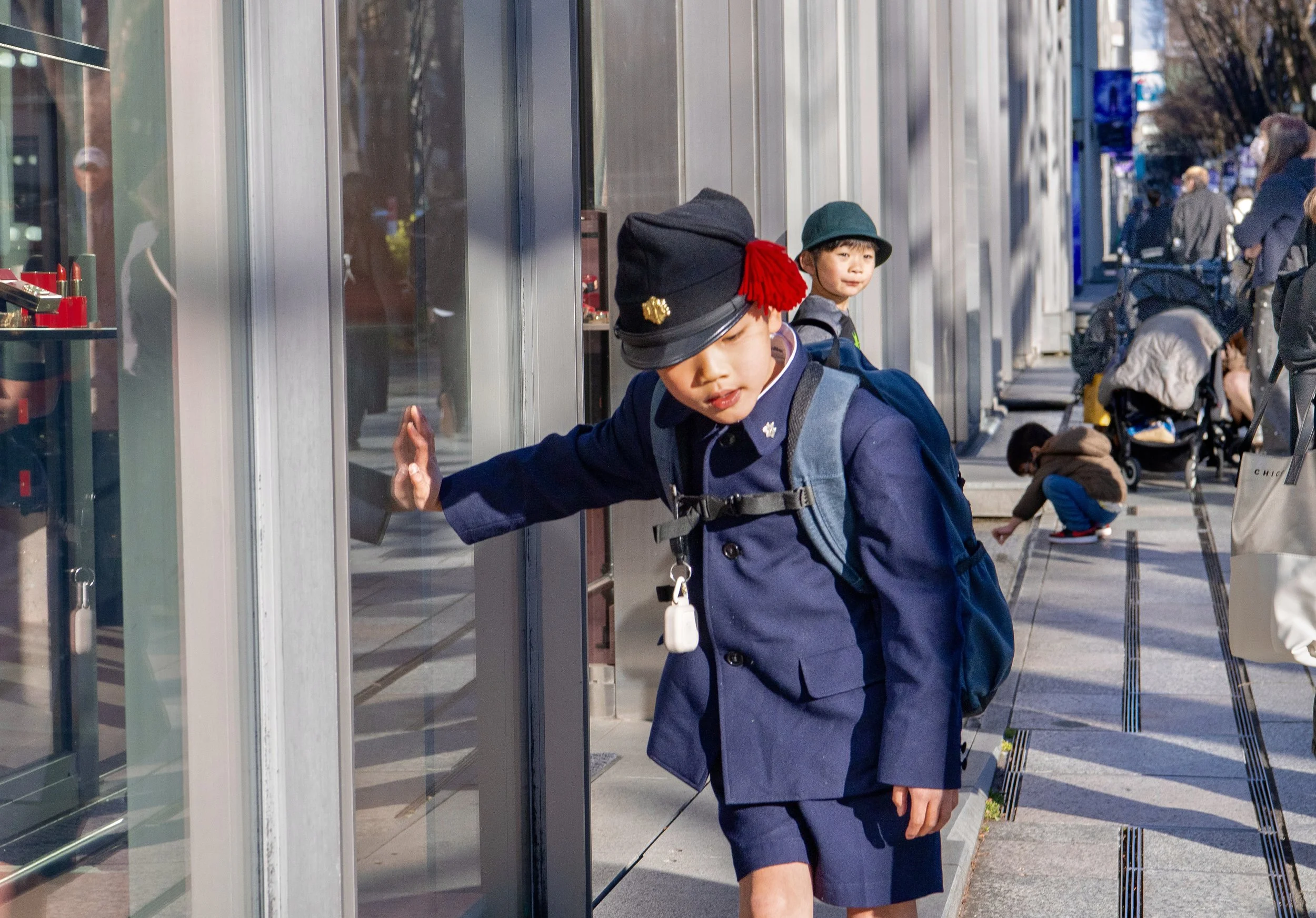 omote red pom boy.jpeg