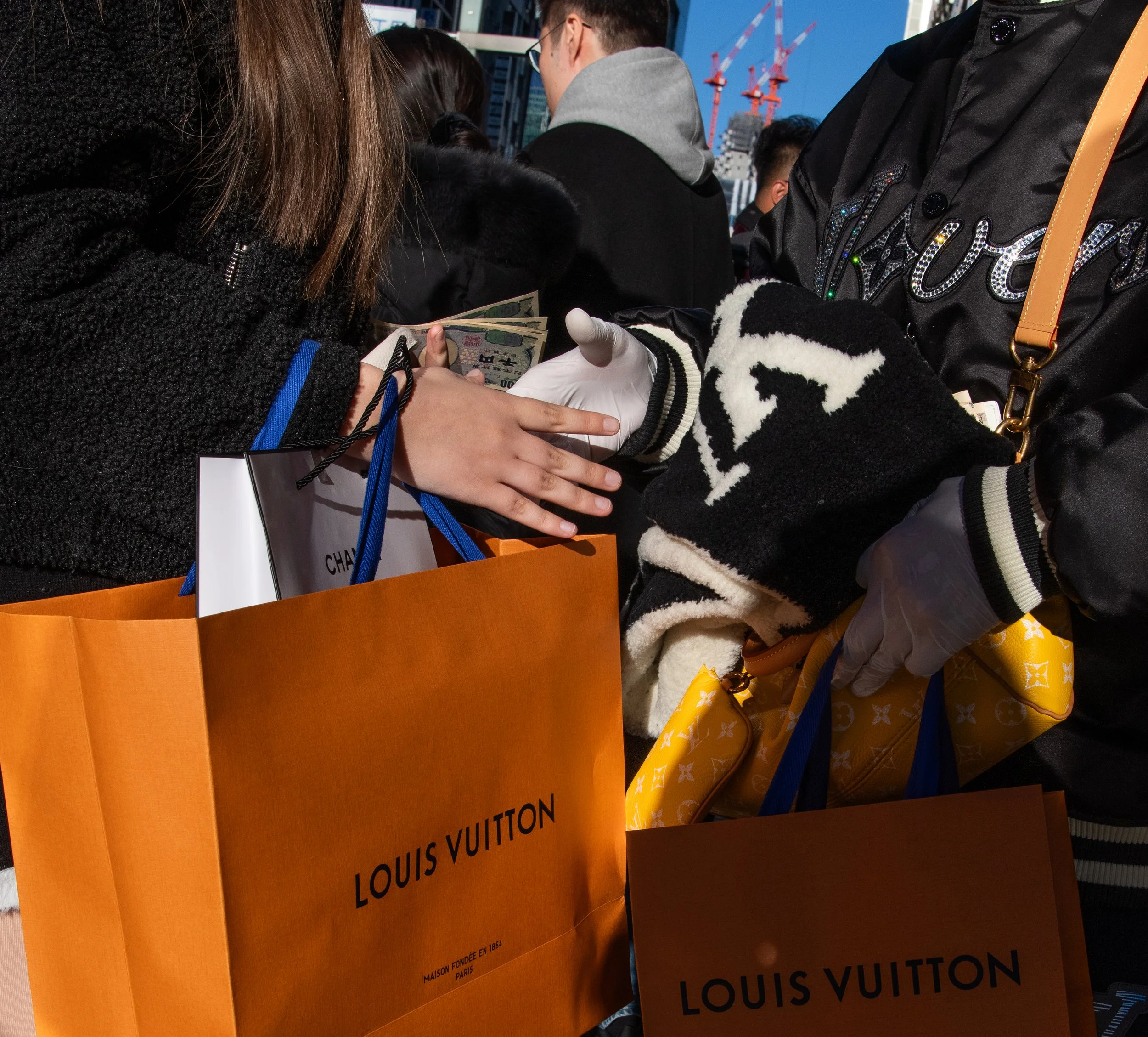 vuiton handshake.jpeg