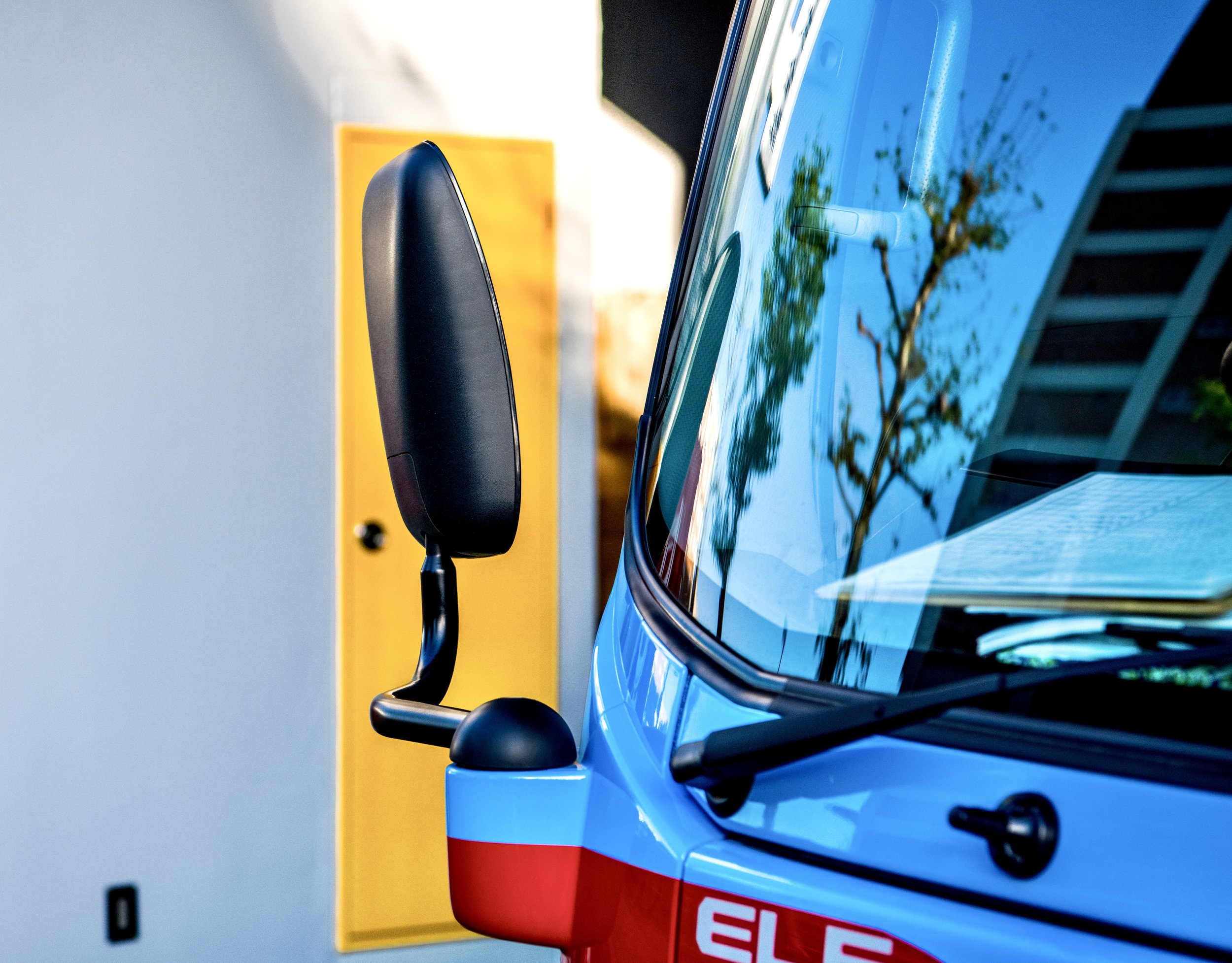 yellow red blue truck.jpeg