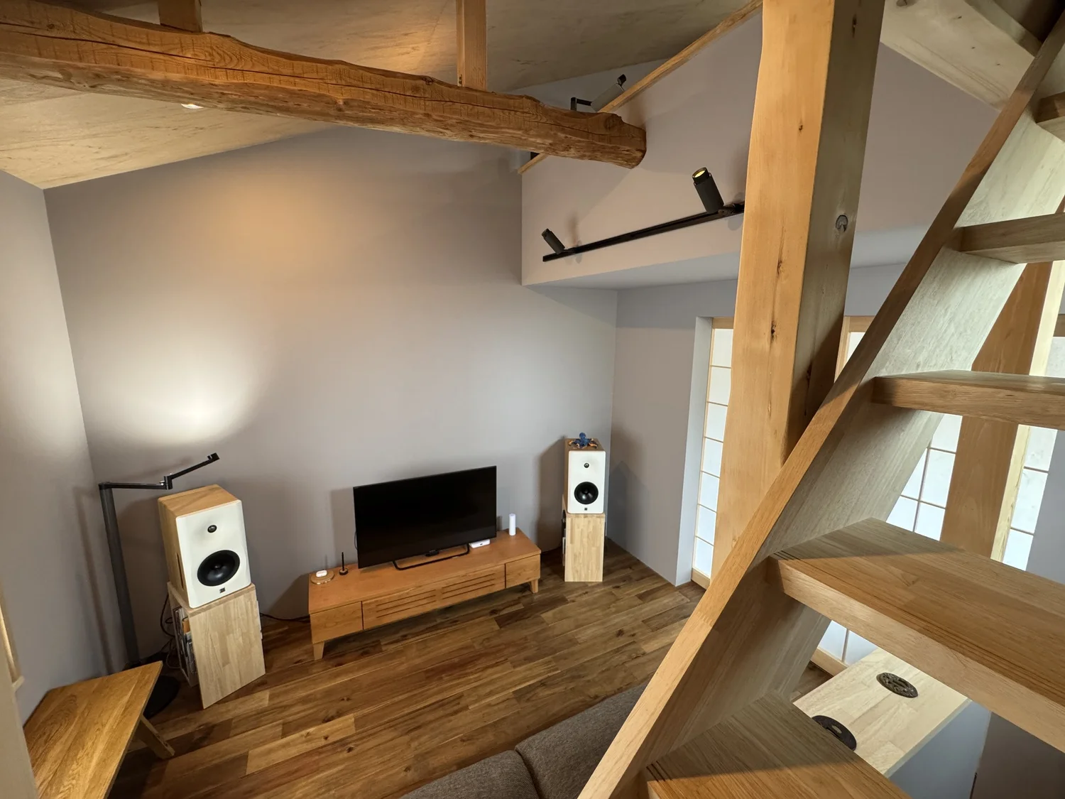 Exposed timber, a wooden stair and living space in our renovated home