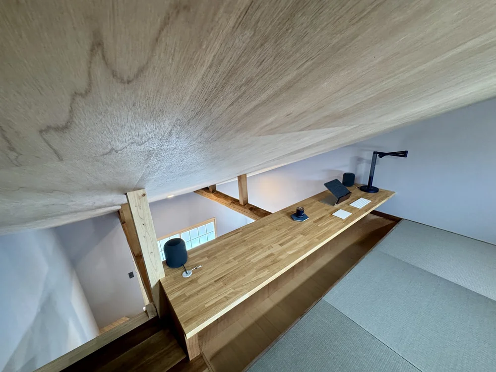 The timber staircase and exposed structural beams