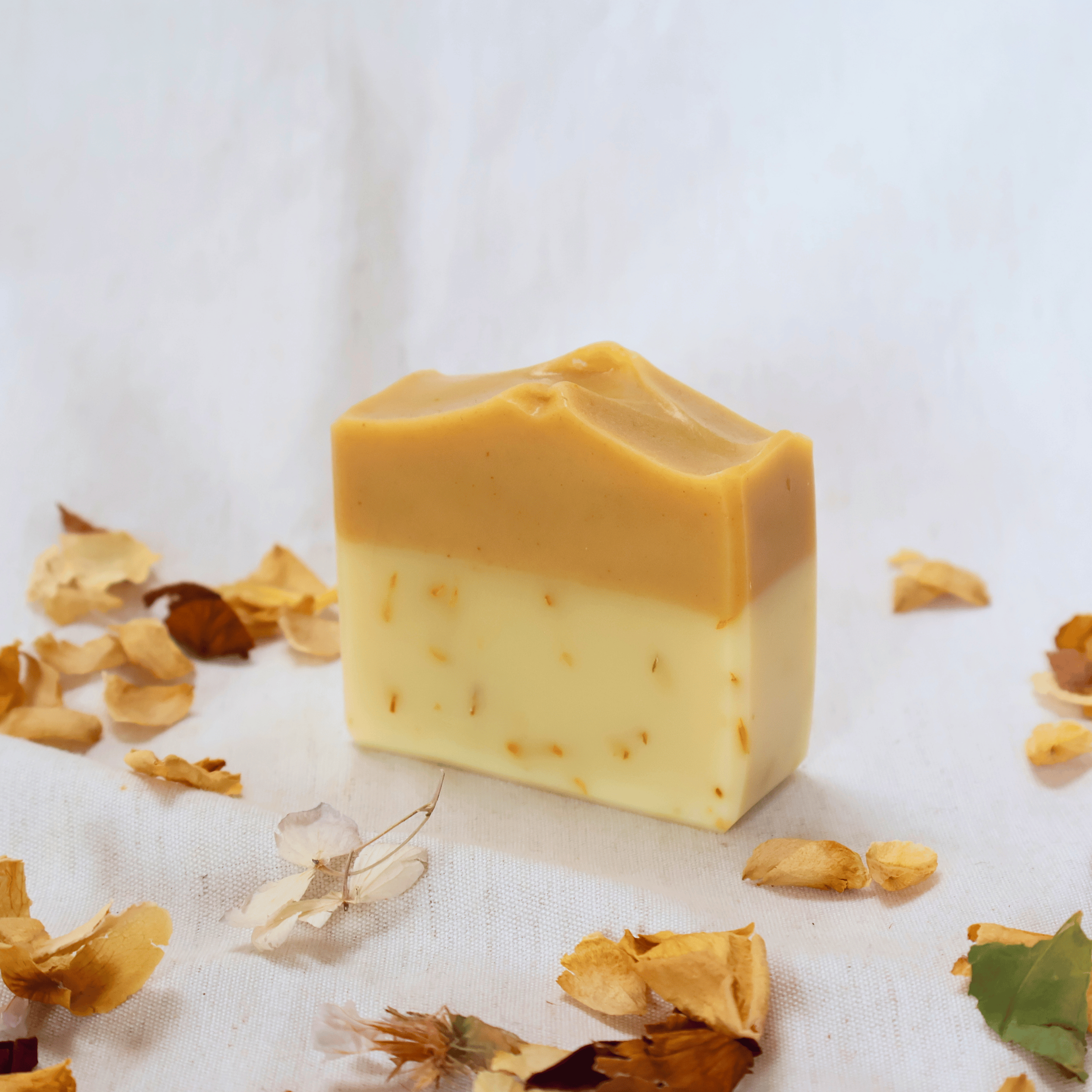 Handmade_natural_orange_patchouli_soap_bar_close-up.png