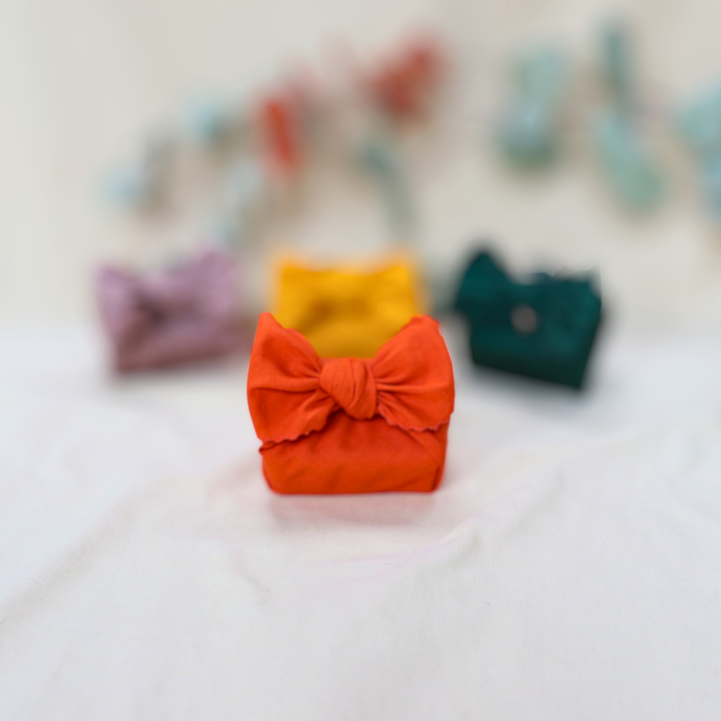 Natural_soap_wrapped_in_cotton_orange_furoshiki.png