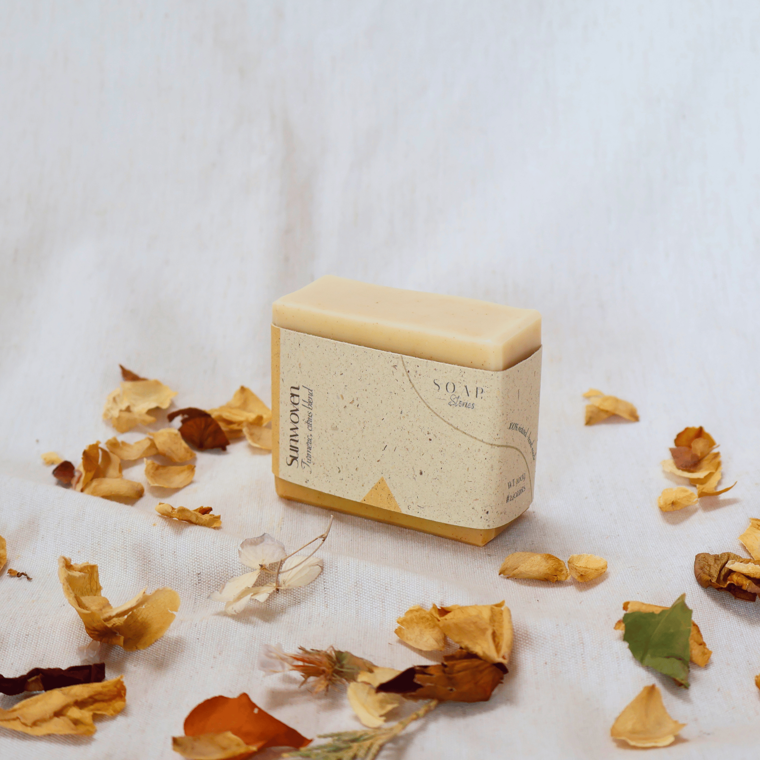 Handmade_natural_turmeric_citrus_soap_bar_with_sleeve.png