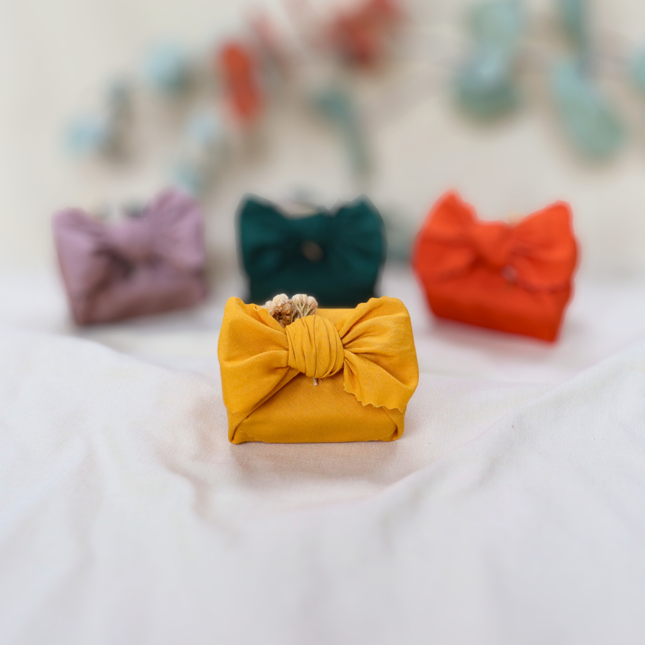 Natural_soap_wrapped_in_cotton_yellow_furoshiki_dry_flowers.png