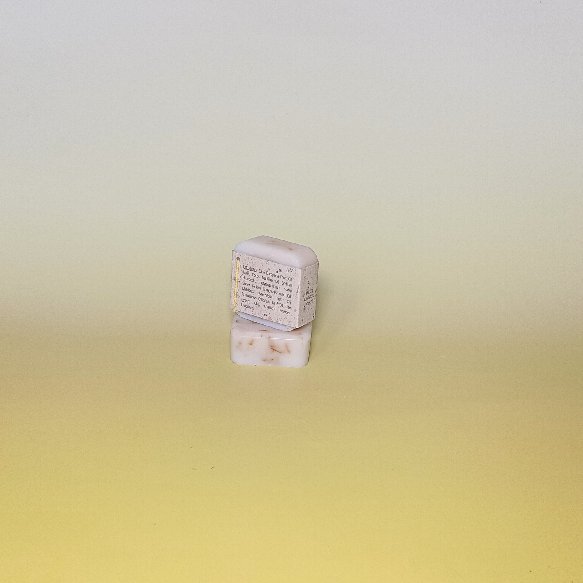 Calendula natural soap wrapped in grass paper sleeve