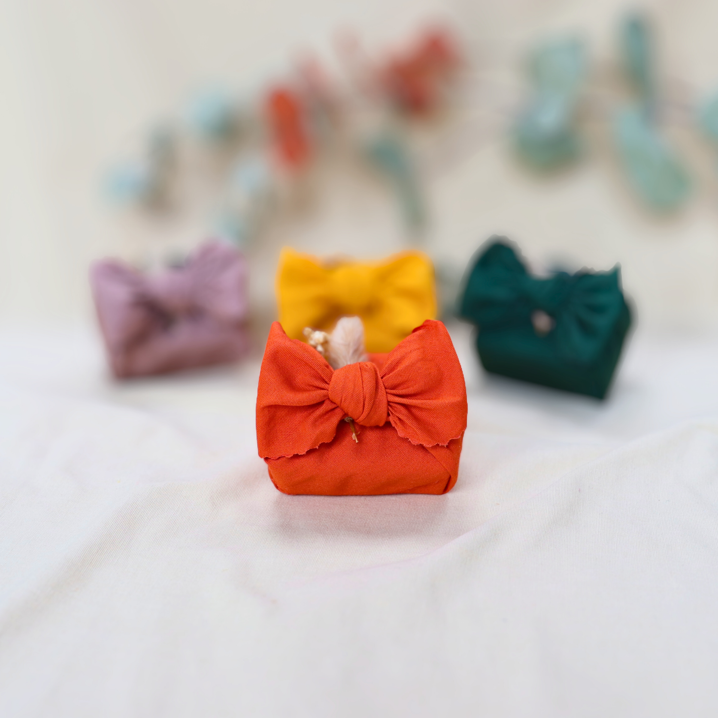 Natural_soap_wrapped_in_cotton_orange_furoshiki_dry_flowers.png