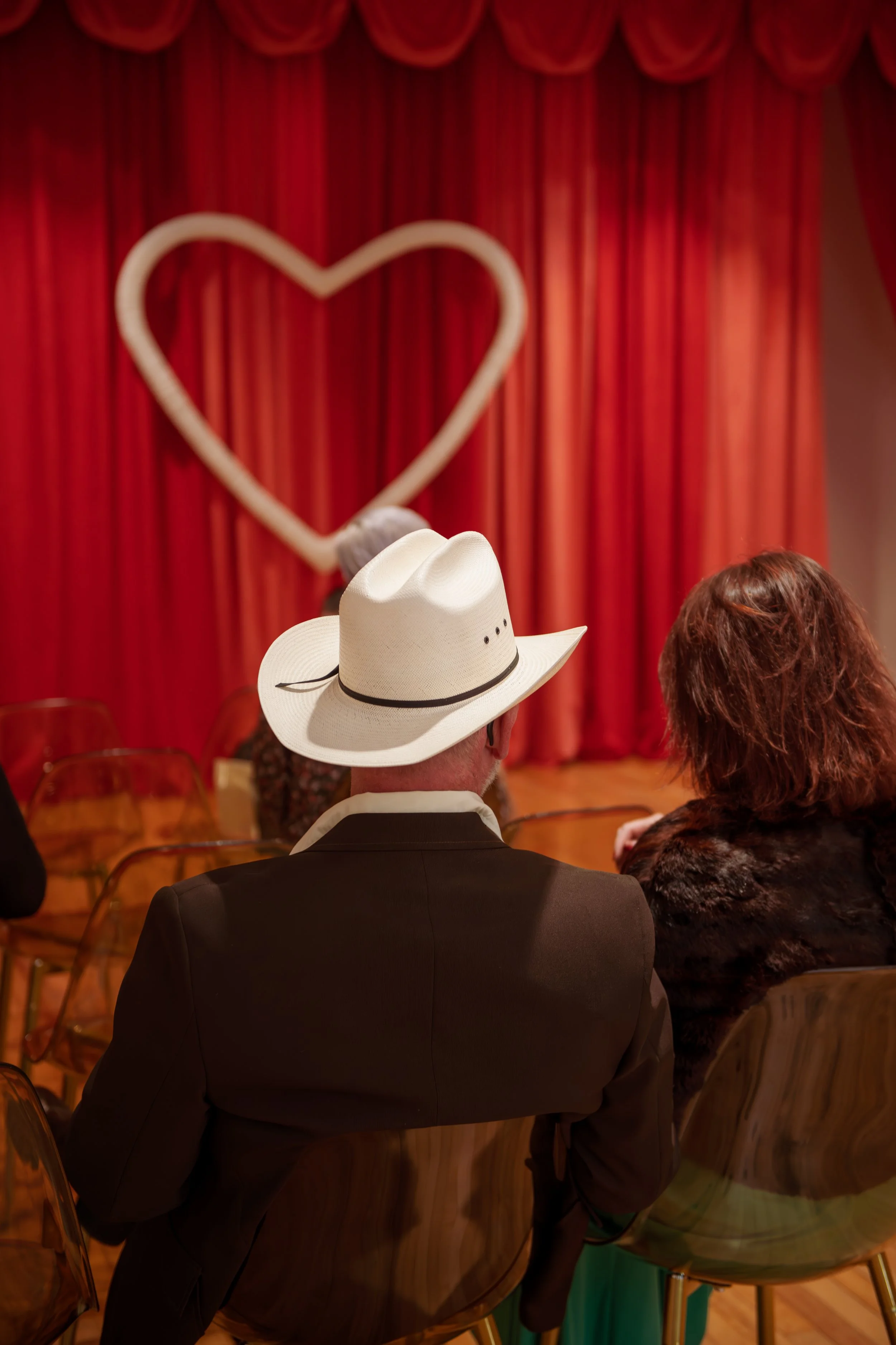 A guest in a cowboy hat at Lucky in Love Chapel