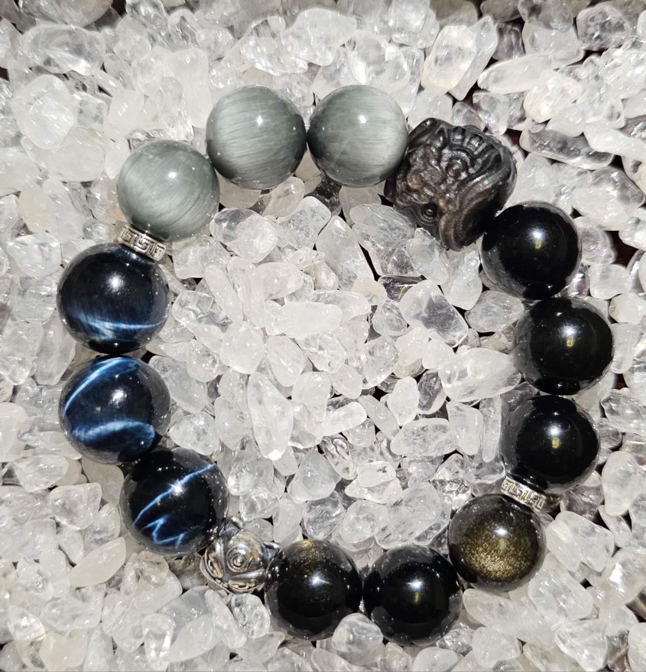 Crystal bracelet with Blue Tiger's Eye, Hawk's Eye, Gold Sheen Obsidian and Silver Sheen Obsidian Tiger Head