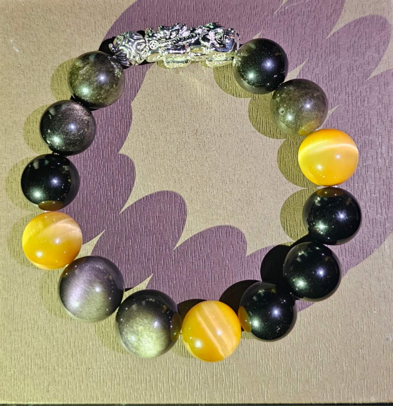 Crystal bracelet with Yellow Tiger's Eye, Silver Sheen Obsidian, Gold Sheen Obsidian and Silver Pixiu (A mythical wild animal)