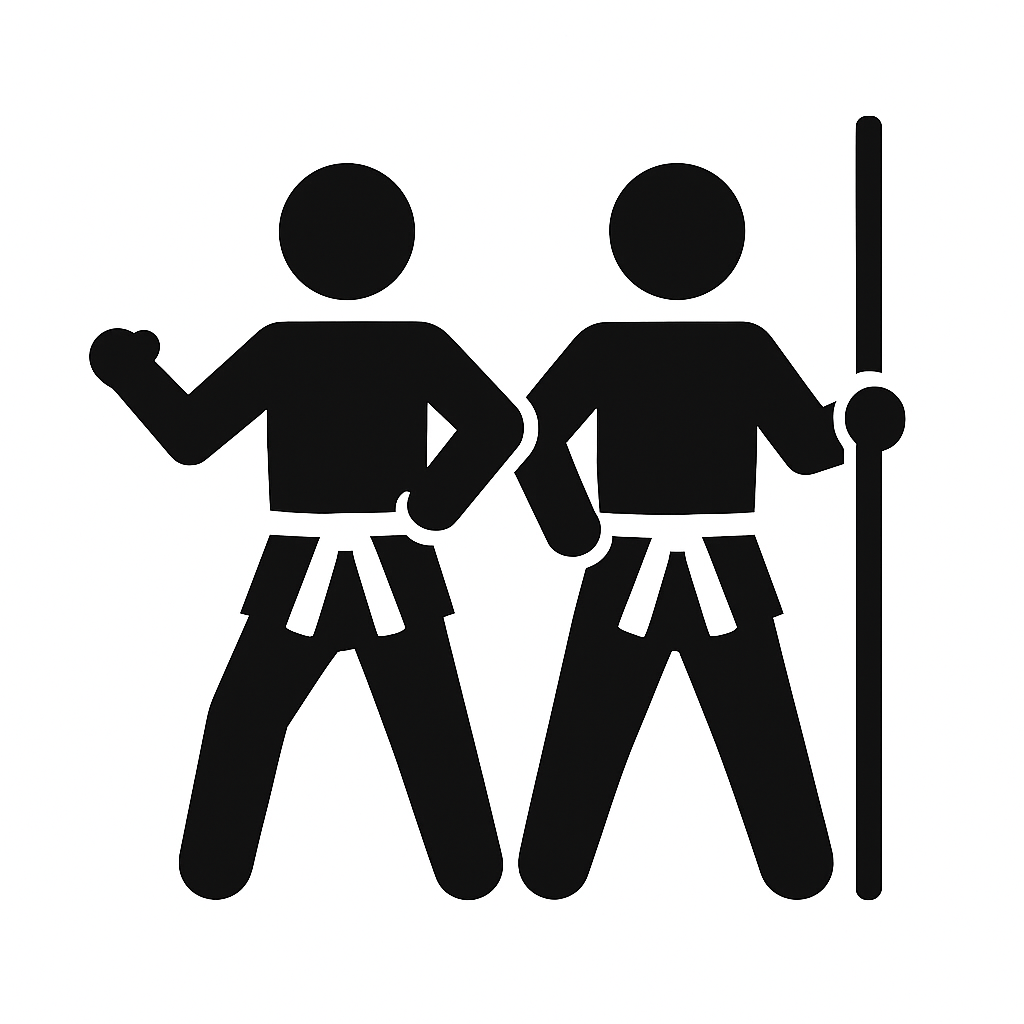 Icon of two martial artists — one in a fighting stance, one holding a bō — representing the Karate and Kobujutsu taught at The Karate Workshop.
