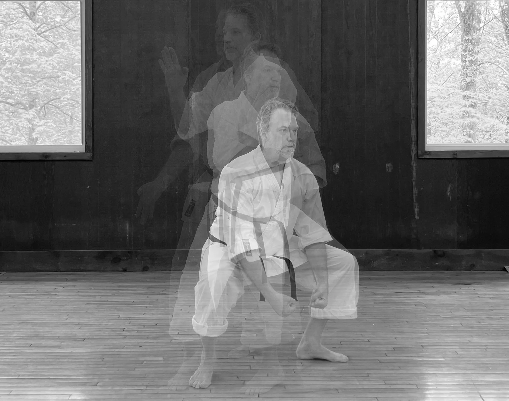 A multiple exposure photograph os Samuel performing a sequence from Seipai Kata