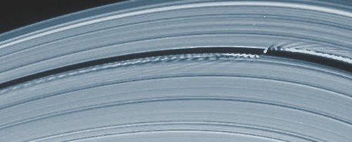 Daphnis carving a clear path through Saturn's rings