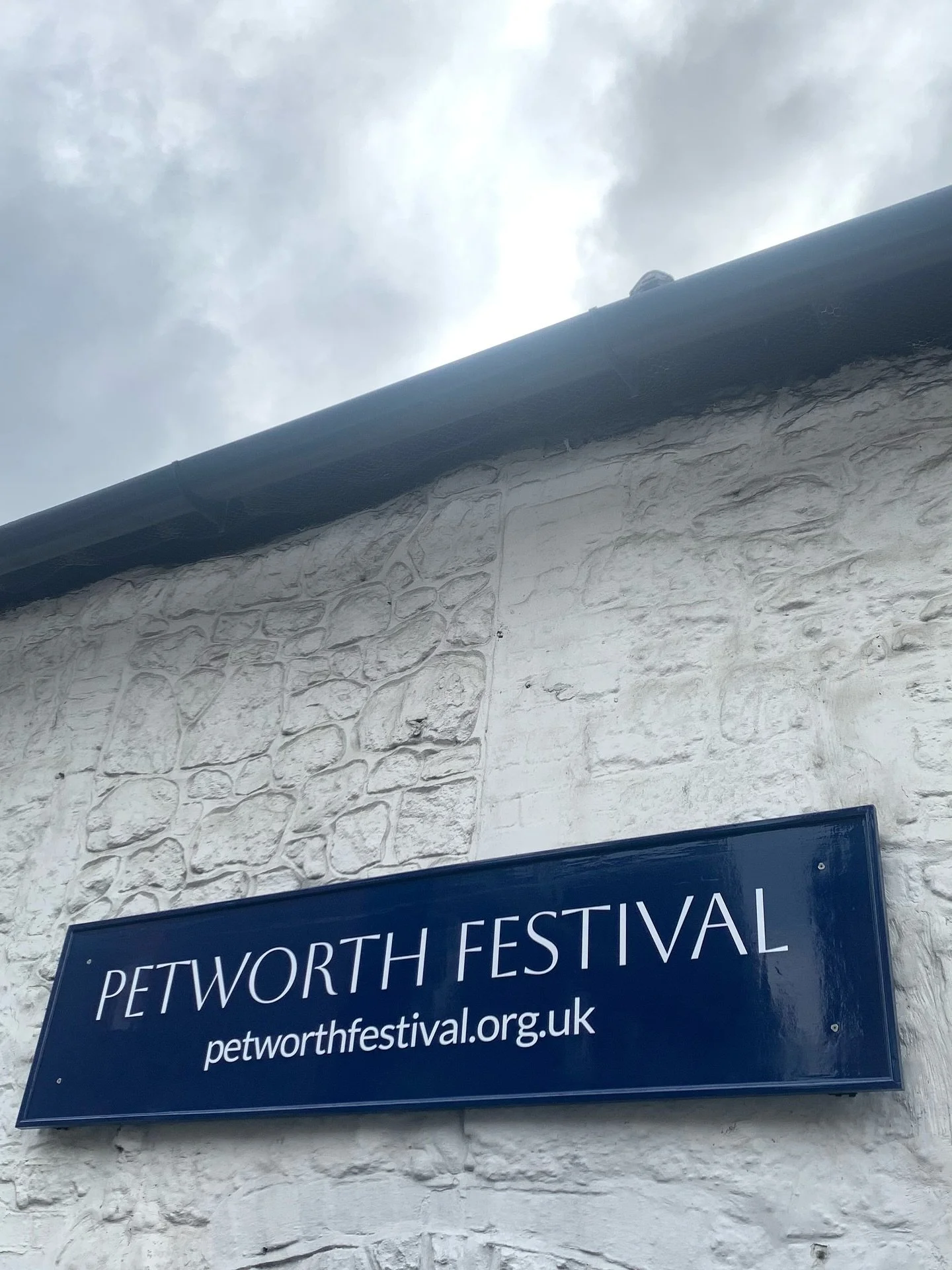 Sign of the times&hellip; The Petworth Festival has a brand new sign!

Huge thanks to our superstar volunteers - Andy for creating this beauty, and Caroline for making sure it&rsquo;s proudly up on the outside wall - swipe to see the action!

Deliver